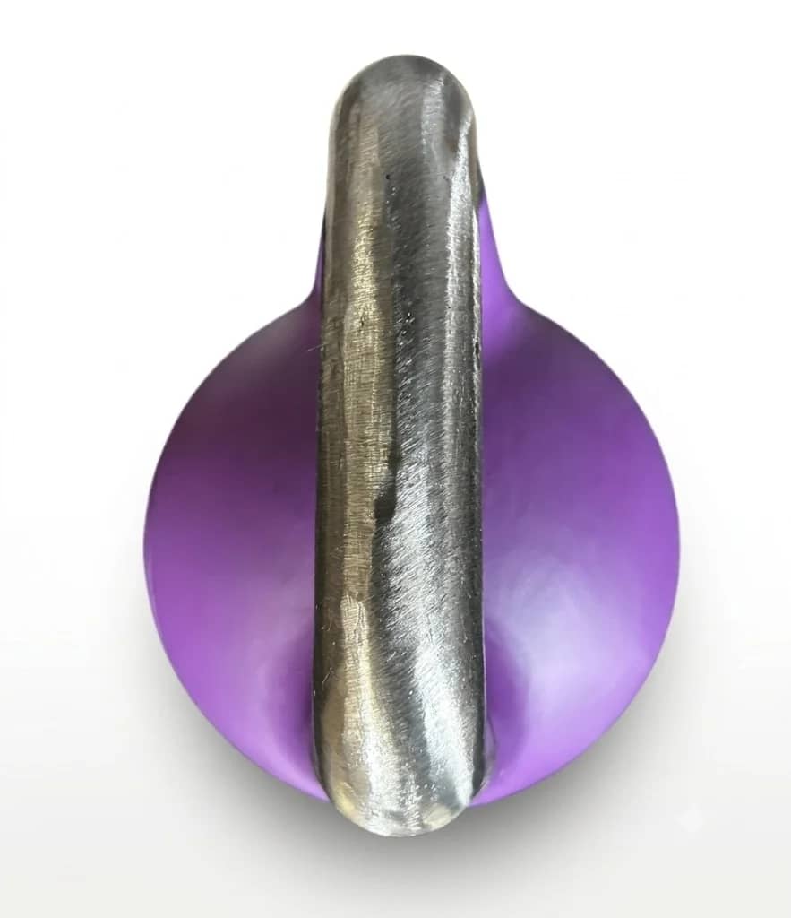 Top-down close-up of the nominal 34 mm unpainted polished-steel handle on an Incore Sports competition kettlebell